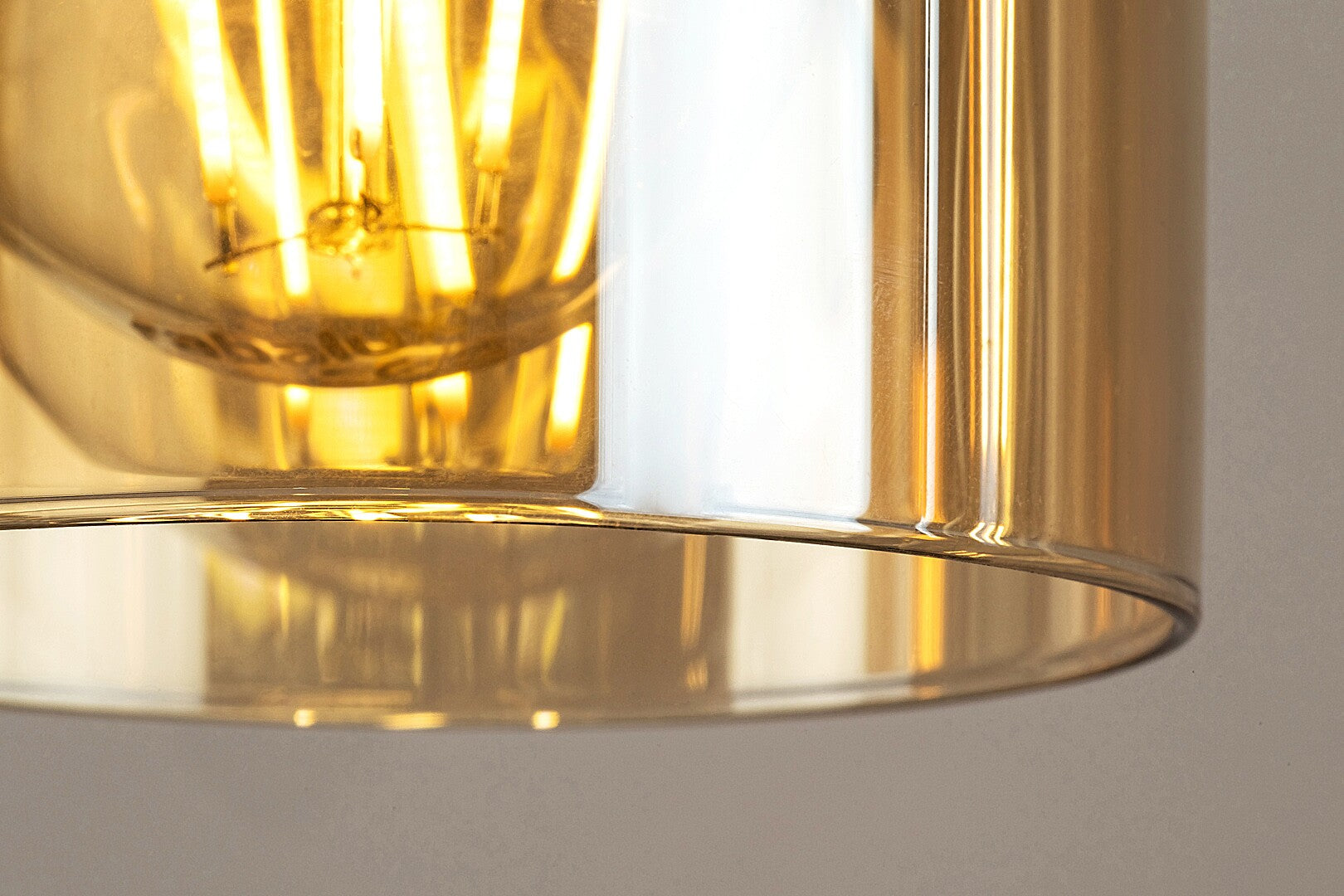 Niylah – RABALUX pendant lamp with amber glass shades and wooden elements