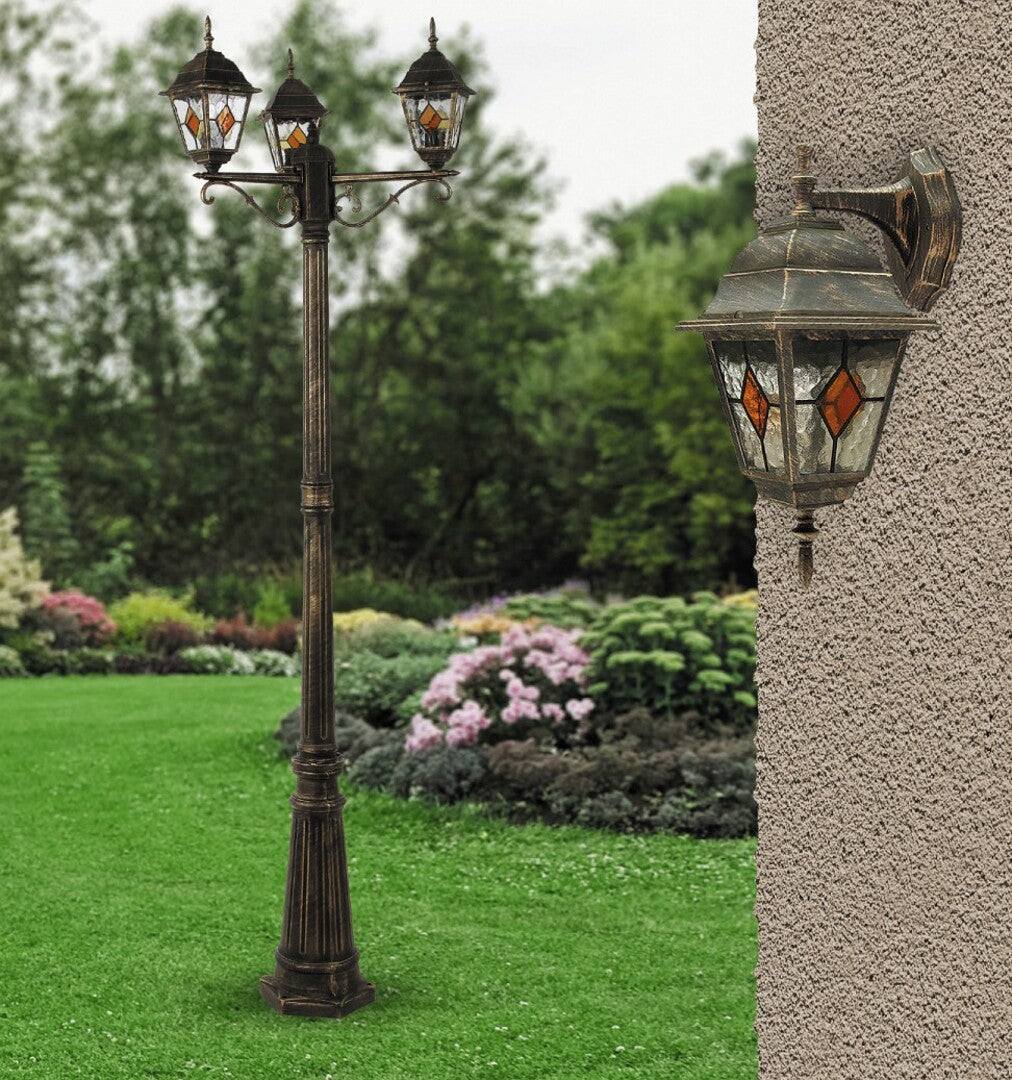 Monaco – RABALUX outdoor wall lamp, antique gold with colored glass shade